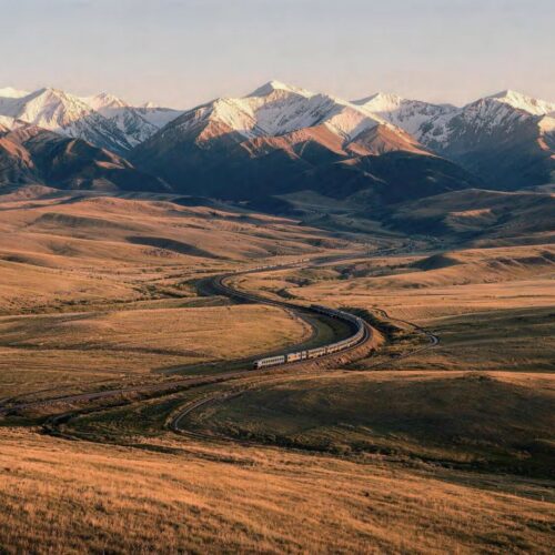 Train crossing the Xinjiang grassland below snow peaks 列车穿越新疆草原雪山 · China Express Travel Baiyun Express